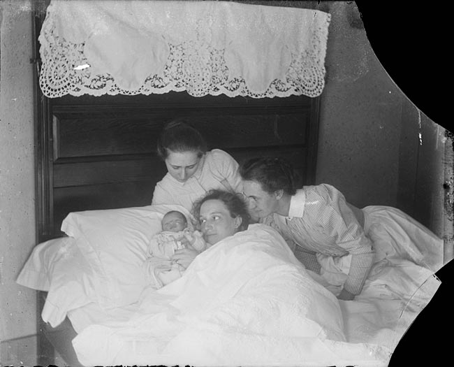 Photographer Harry Gretter took this candid shot of his wife with their newborn son, Vic, ca. 1900.